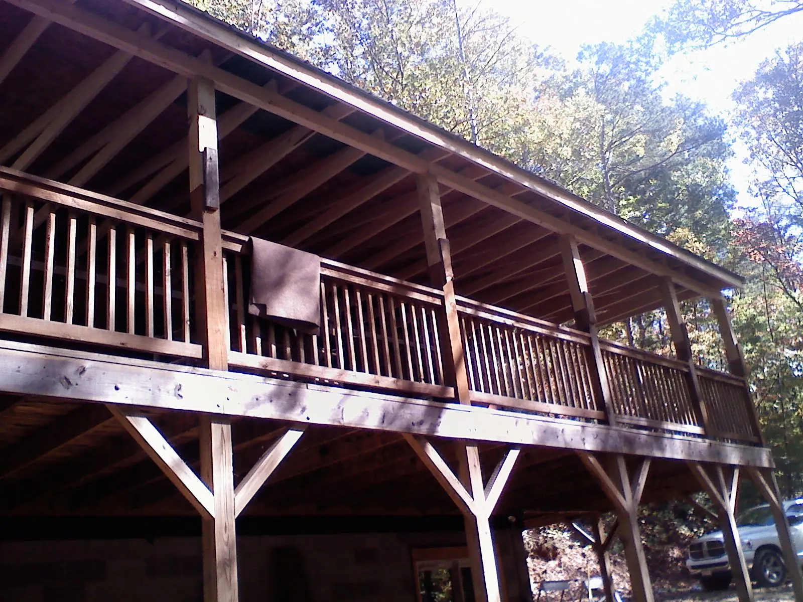 Timber framing under a new elevated porch and deck — Roof Leak Repair in East Hartland by Roofing Brothers